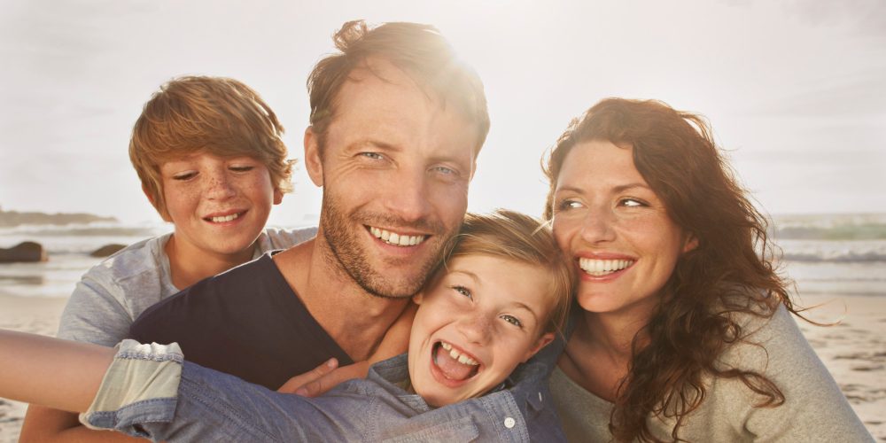 Portrait of family outdoors, close up