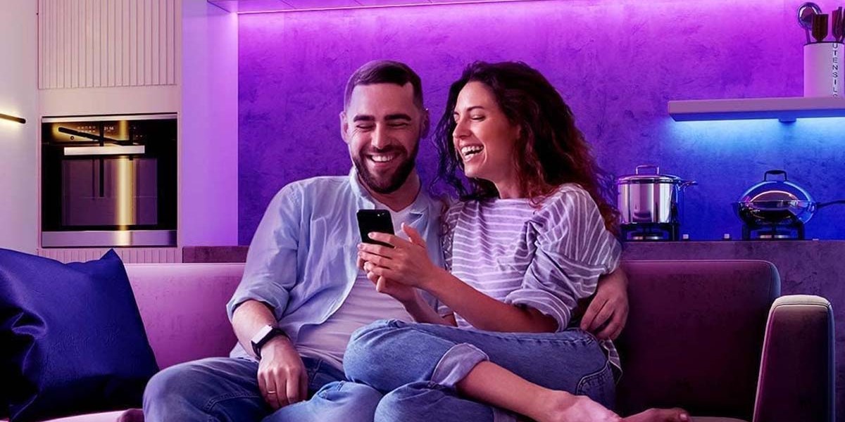 a man and a woman sitting on a couch