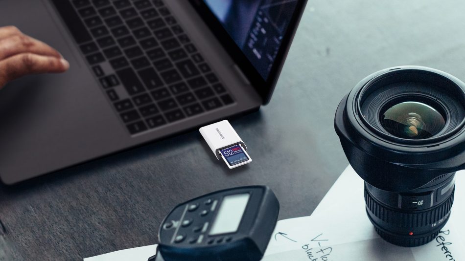 a laptop computer sitting on top of a table