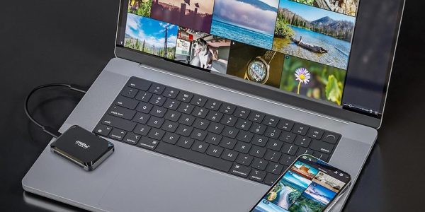 an open laptop computer sitting on top of a table