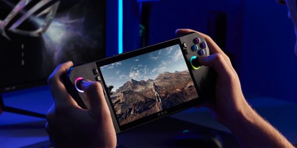 A person holding an ROG Ally X gaming handheld.