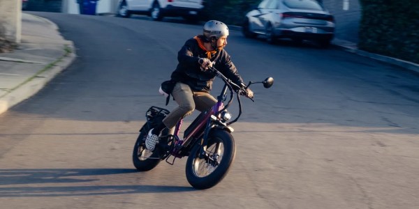 a man riding a motorcycle