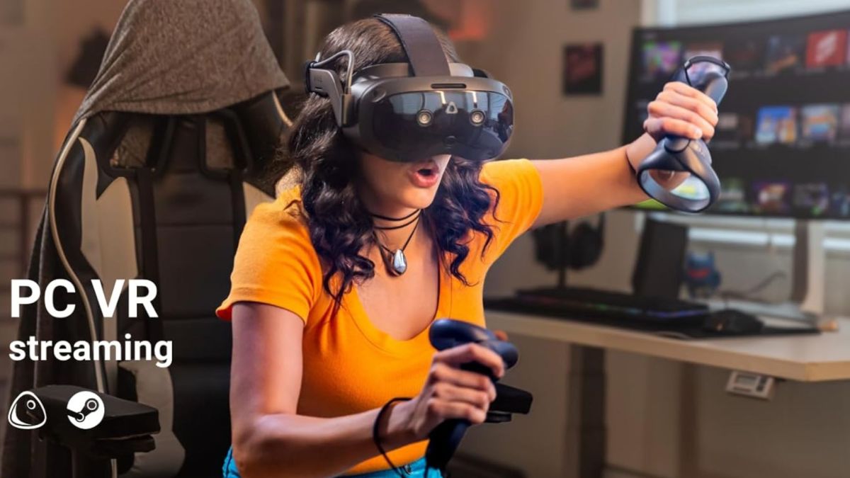 Image showing a person wearing HTC Vive Focus Vision VR headset.