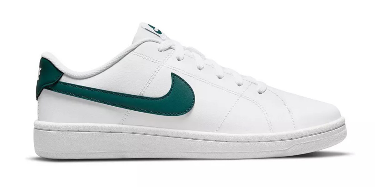 a white and green tennis shoe