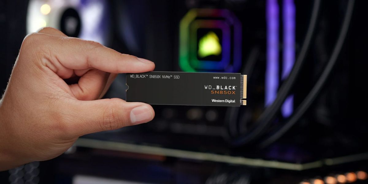 Image showing a person holding WD_BLACK's SN850X SSD.