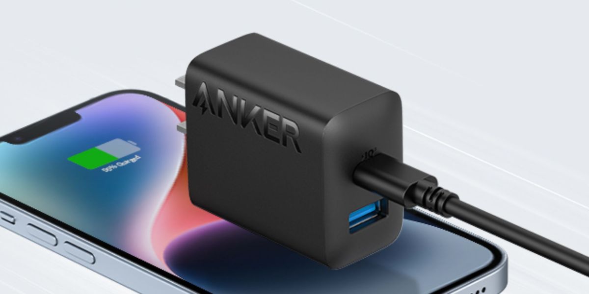 Image showing Anker's 20W USB-C charging with a cable over a phone.